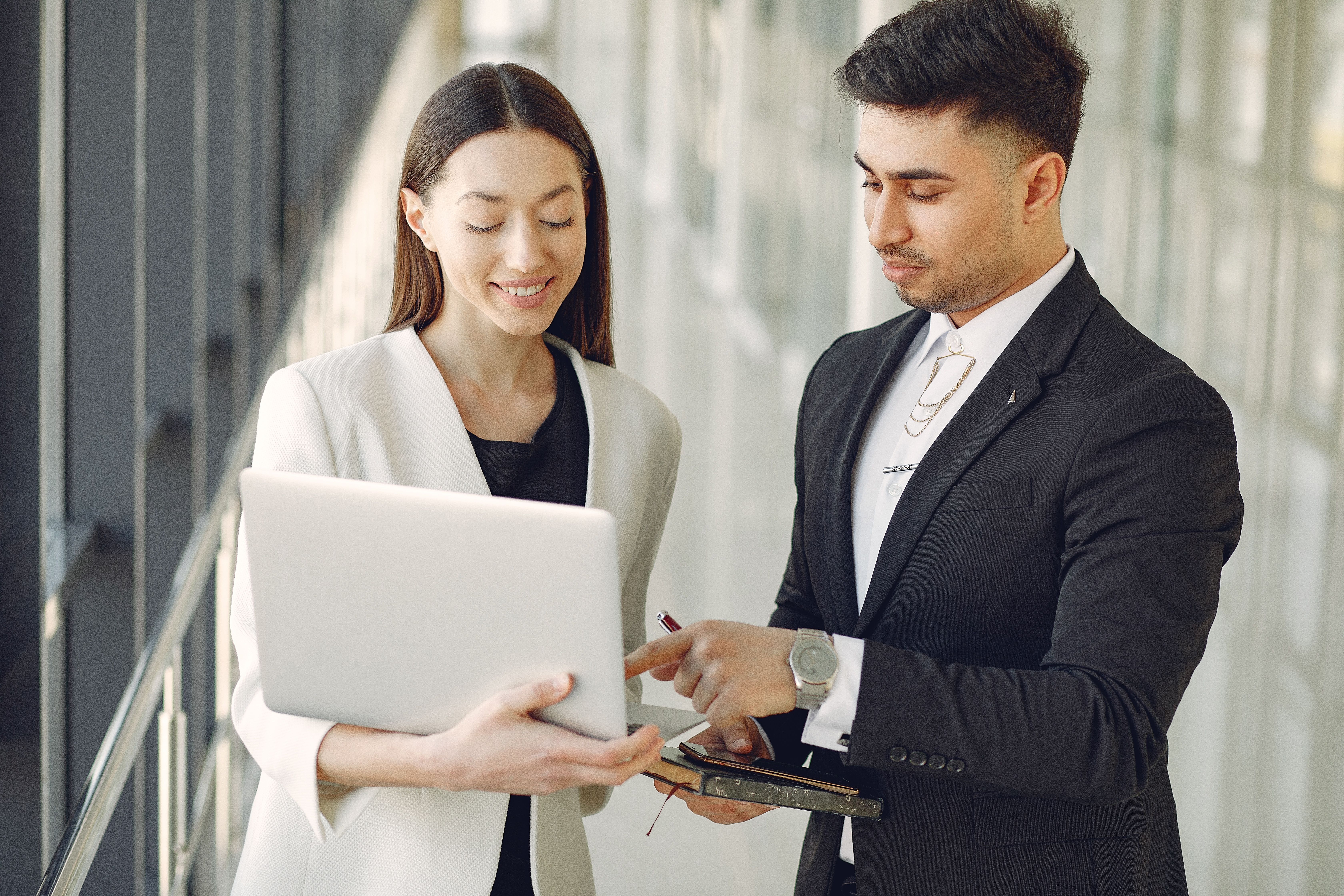 Attorney and client discussing documents during a consultation